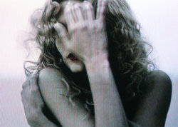 A picture of the ERZ power plant chimney and of the Prime Tower in Zurich