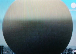 A picture of the ERZ power plant chimney and of the Prime Tower in Zurich