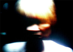 A picture of the ERZ power plant chimney and of the Prime Tower in Zurich