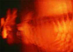 A picture of the ERZ power plant chimney and of the Prime Tower in Zurich