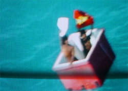 A picture of the ERZ power plant chimney and of the Prime Tower in Zurich