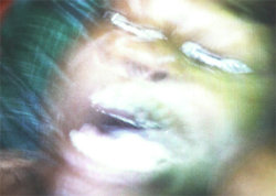 A picture of the ERZ power plant chimney and of the Prime Tower in Zurich