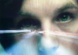 A picture of the ERZ power plant chimney and of the Prime Tower in Zurich